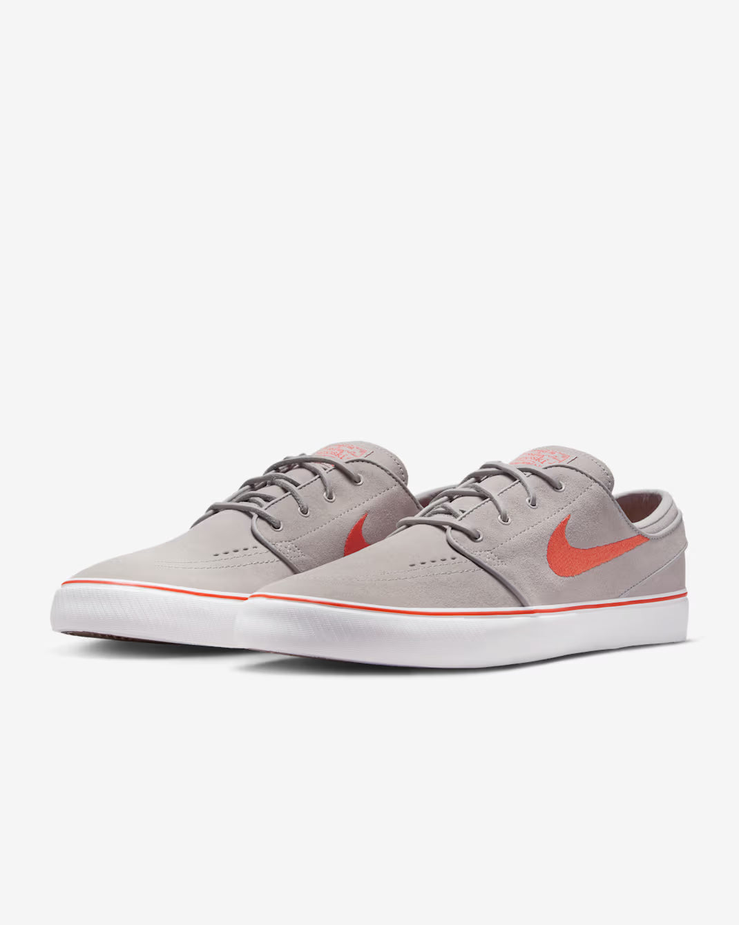 Nike SB Zoom Janoski OG+ college grey suede skate shoes with white sole and orange swoosh