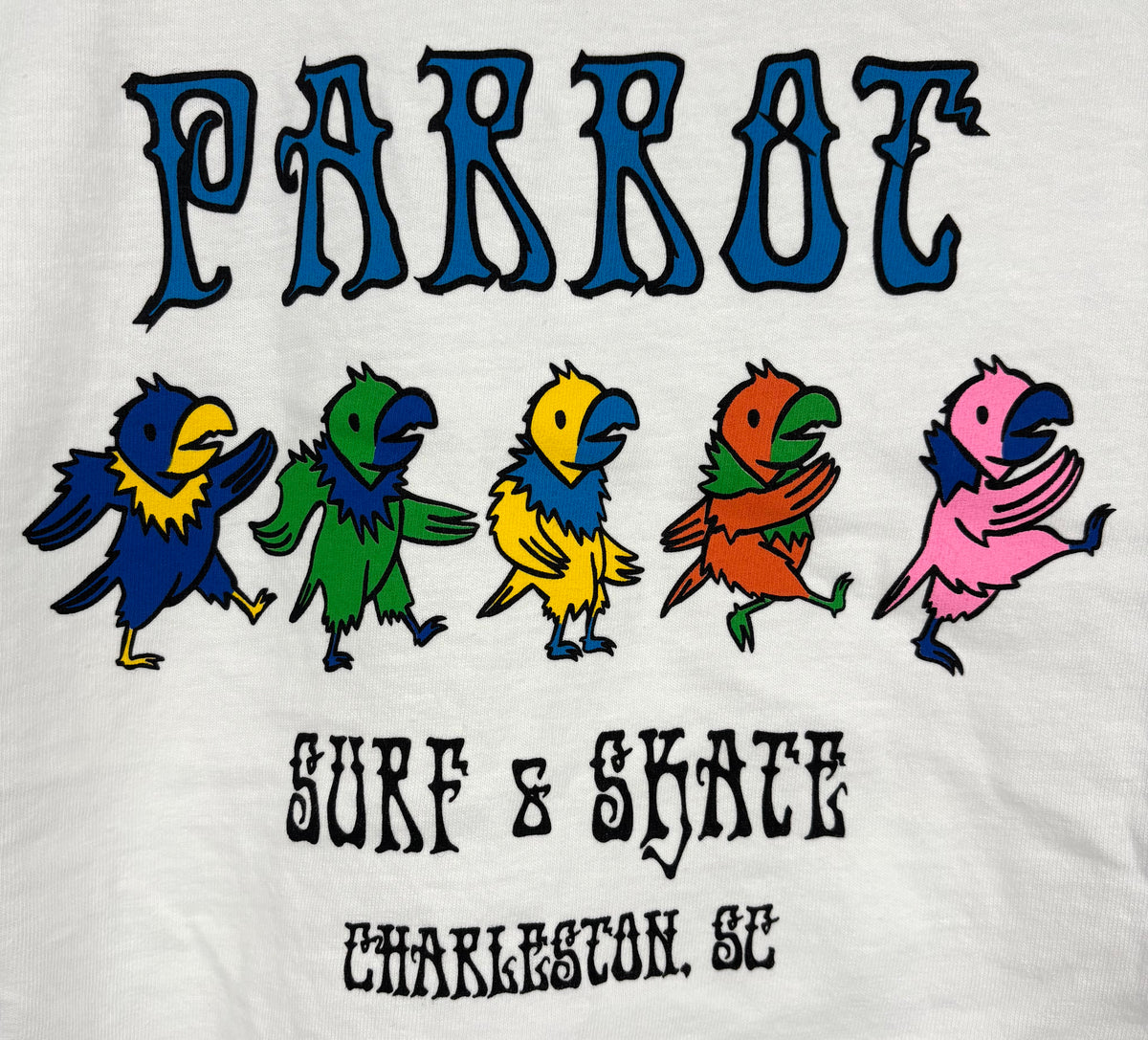 Close-up view of Dancing Parrots Youth Tie-Dye T-Shirt – Heavyweight Cotton skateboarding product graphics design