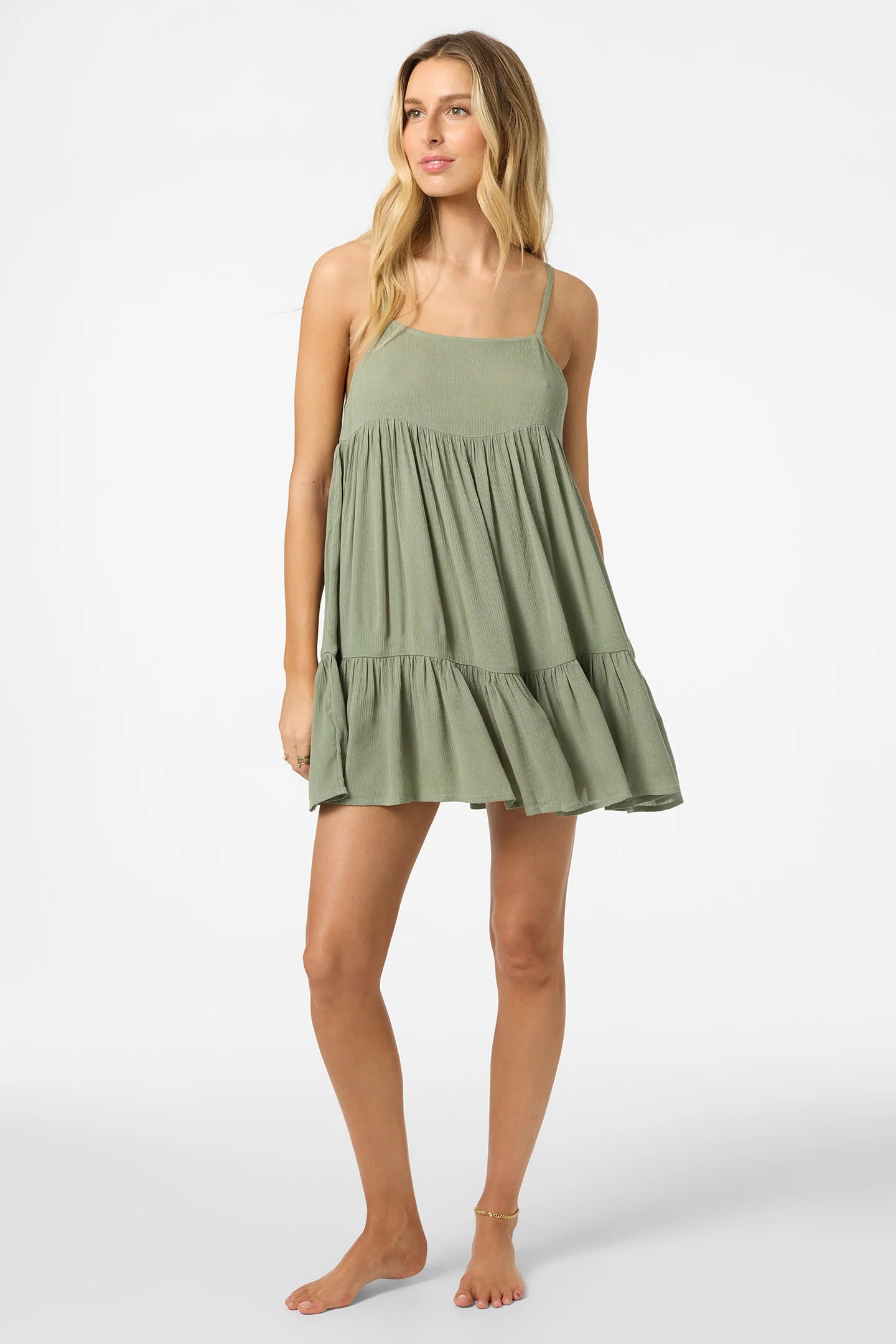 Close-up of O'Neill Saltwater Solids Rilee Mini Cover-Up Dress tiered skirt detail