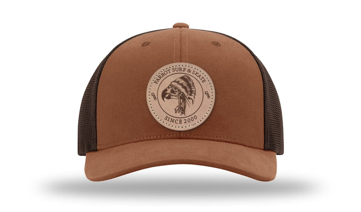 Parrot Surf & Skate 112LN Indian Trucker hat in Autumn/Brown with leather Indian patch, front view - Parrot gear