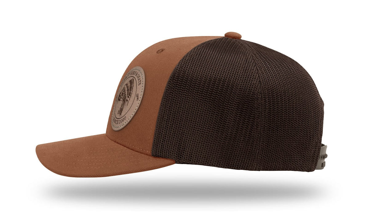 Parrot Surf & Skate 112LN Indian Trucker hat in Autumn/Brown with leather Indian patch, side profile view - Parrot gear