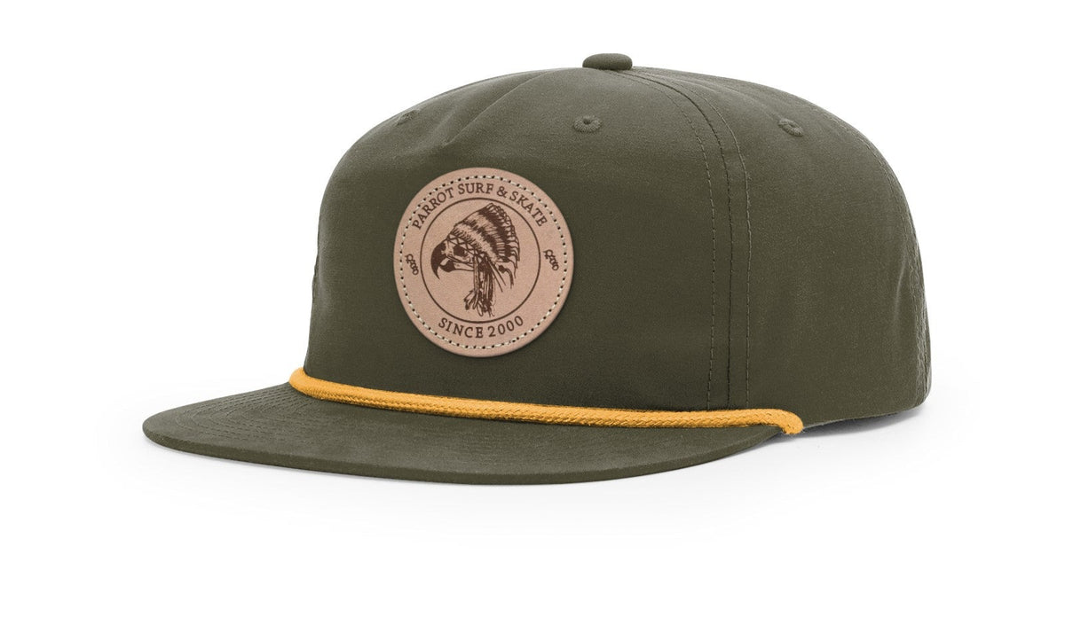 Parrot Surf & Skate 256 Indian Rope hat in Umpqua Loden with gold rope and leather Indian patch, studio angle view - Parrot gear