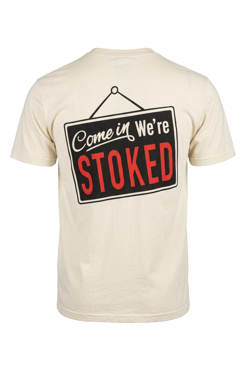 Parrot Surf & Skate Stoked Tee in Ivory, back view with Come in We're STOKED shop sign graphic - Parrot gear