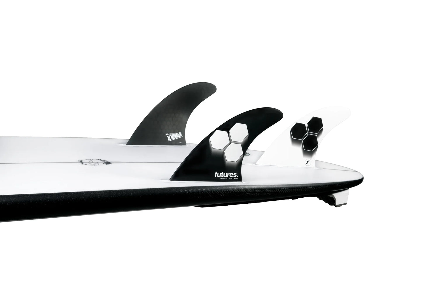 AM2 Honeycomb Tri Futures Fins installed on surfboard view