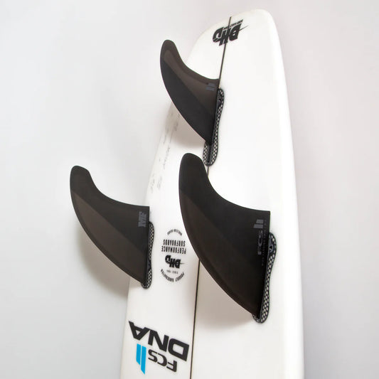 FCS II Mick Fanning Twin + 1 PC Fin Set installed on surfboard