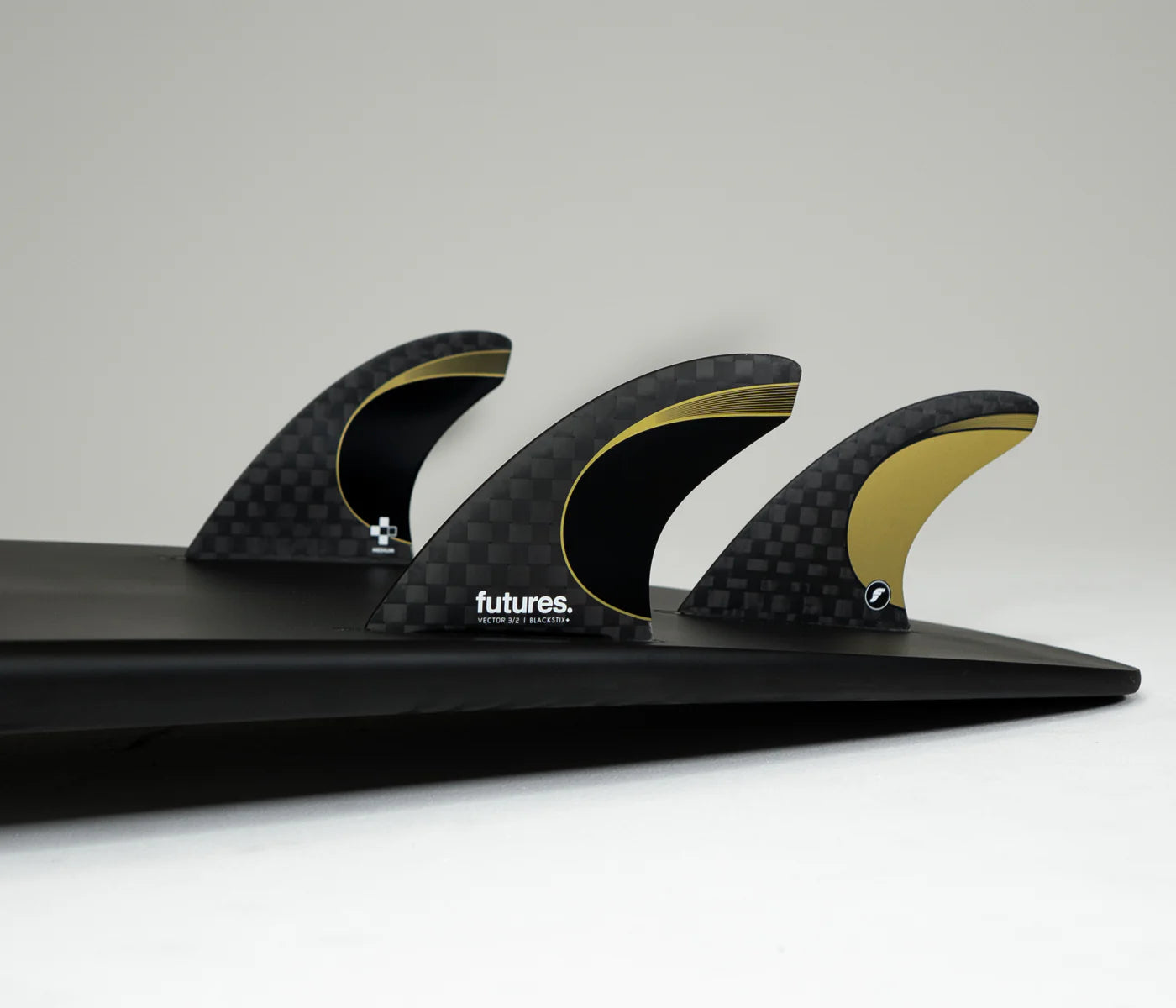 Vector Blackstix 3/2 Thruster Medium Futures Fins installed on surfboard view