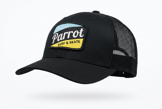 Parrot Surf & Skate 112 Work Blue Patch Trucker Hat in Black, side view with mesh back - Parrot gear