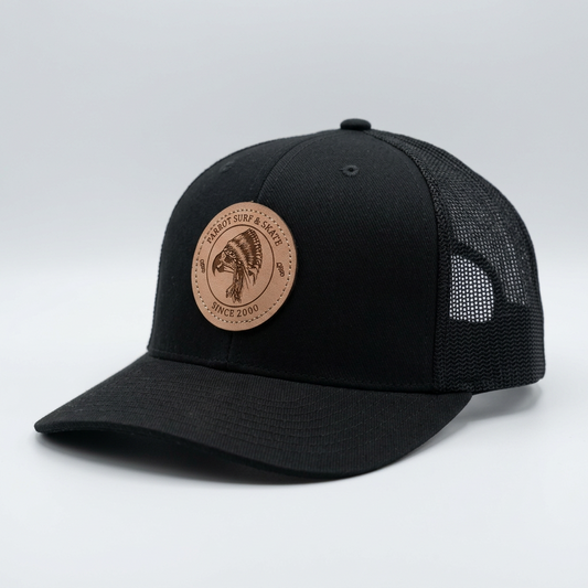 Parrot Surf & Skate 112LN Indian Trucker hat in Black with leather Indian patch, side view - Parrot gear