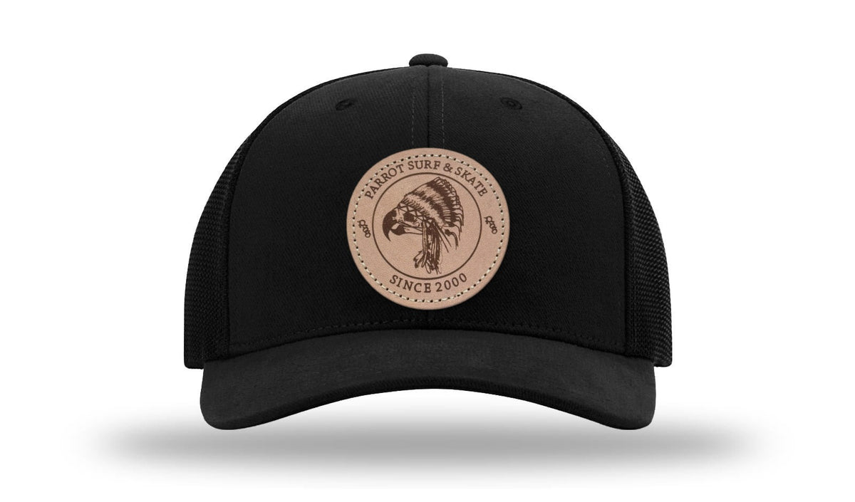 Parrot Surf & Skate 112LN Indian Trucker hat in Black with leather Indian patch, front view - Parrot gear
