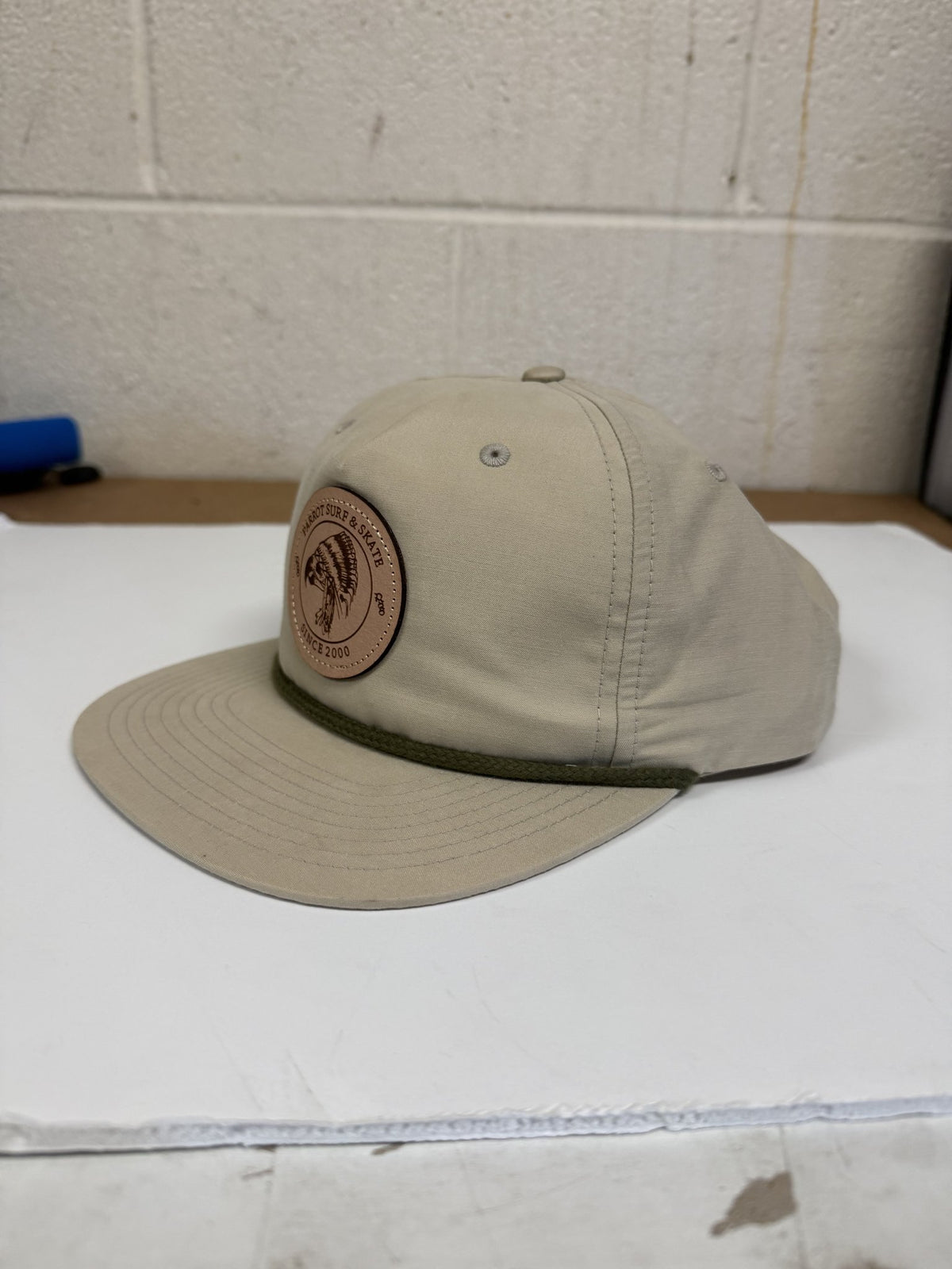 Parrot Surf & Skate 256 Indian Rope hat in Umpqua Sand Dune with loden rope and leather Indian patch, side view - Parrot gear