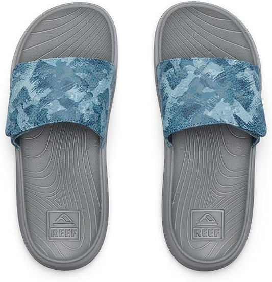 Reef Kids Salty Slide cushioned footbed and strap detail close-up