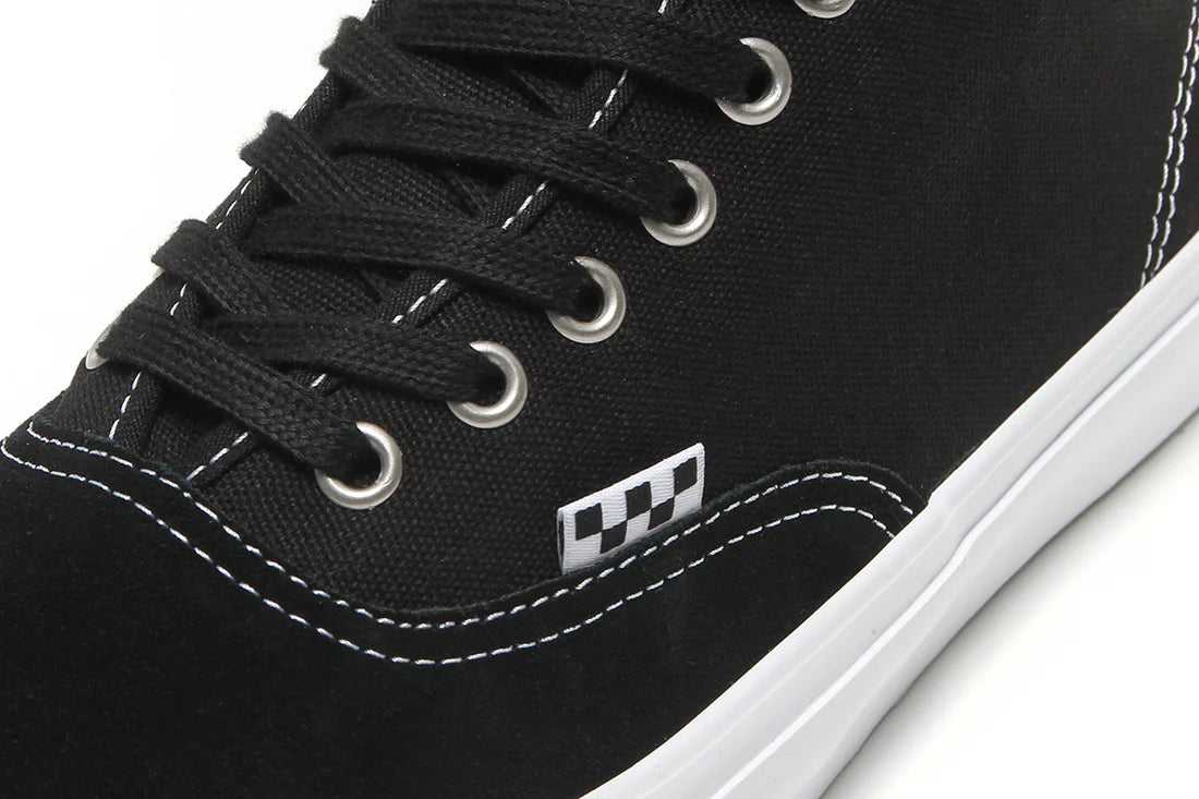 Vans Skate Authentic Mid Y28 skate shoe detail with canvas upper and waffle sole