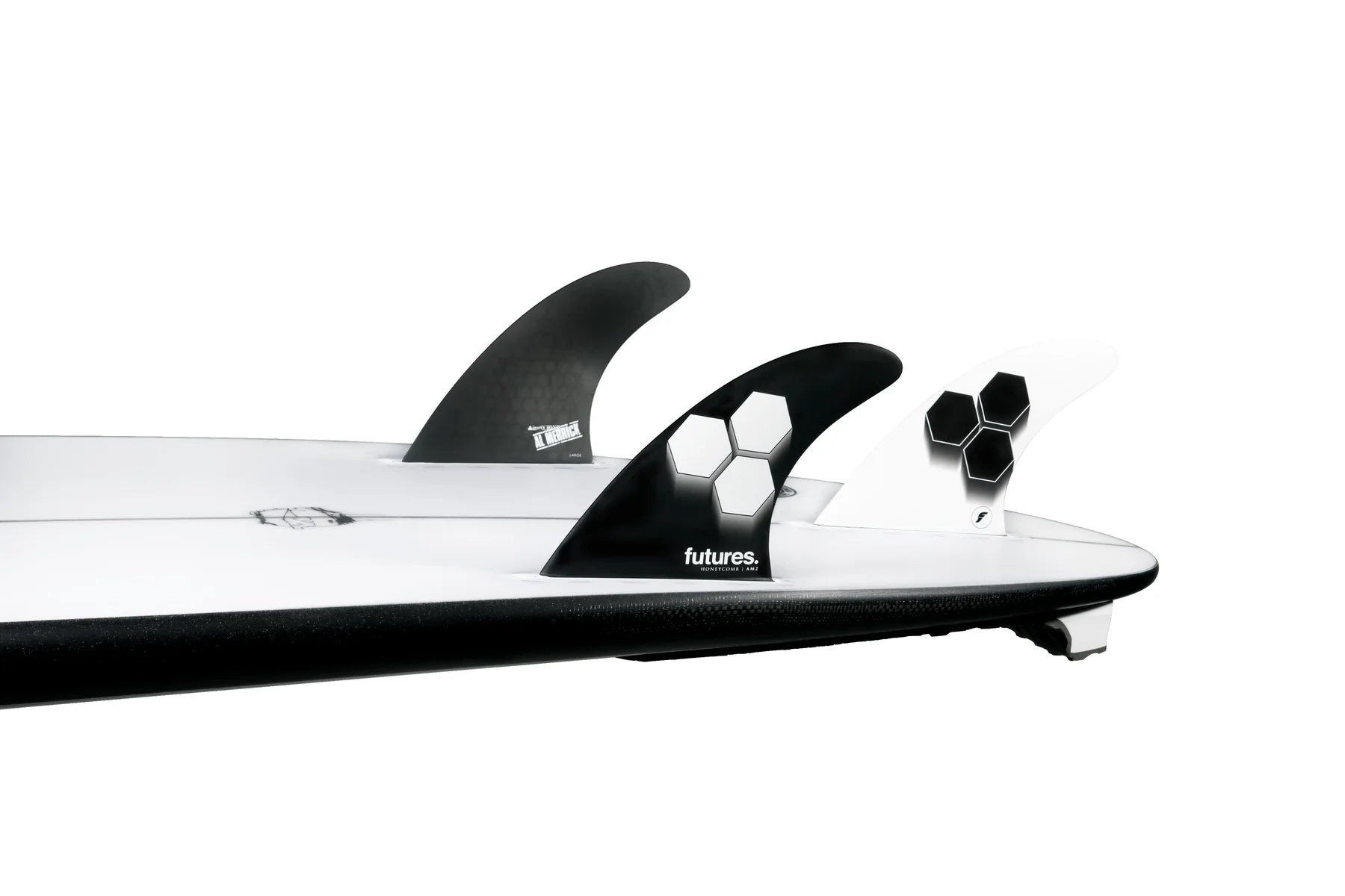 AM2 Honeycomb Tri Futures Fins installed on surfboard view