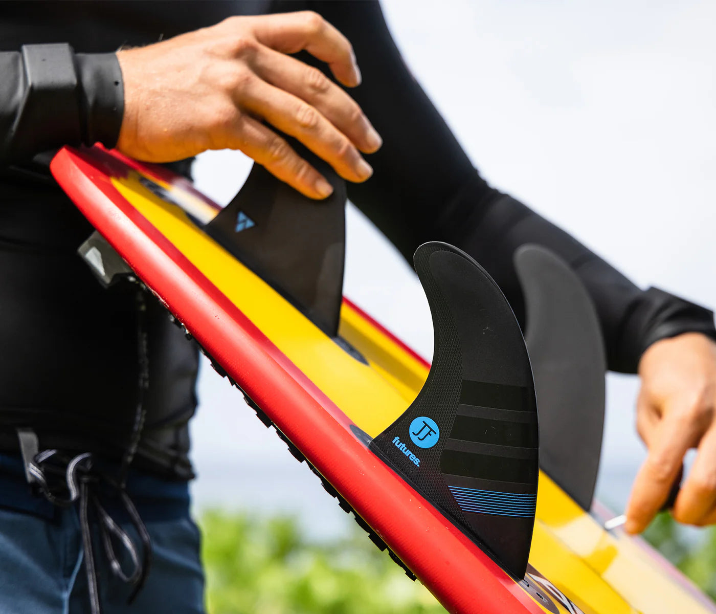 F4 JJF Alpha Tri Futures Fins installed on surfboard view