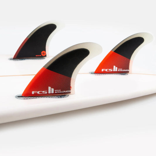 FCS II Accelerator PC Tri Fin Set installed on surfboard view