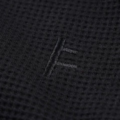 Former AG Raglan Waffle Sweater Black waffle knit and tonal Franchise F detail
